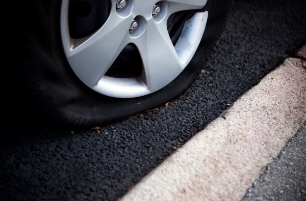 Don't Panic - 6 Steps To Fixing A Flat On The Highway